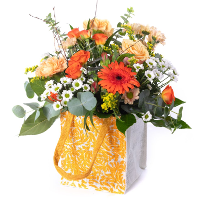 Hello Sunshine  - Bright, cheerful, and full of warmth — Hello Sunshine is a radiant mix of warm colours, beautifully offset by fresh greenery. Presented in a charming jute bag, it’s a vibrant design that brings instant joy and positivity.
